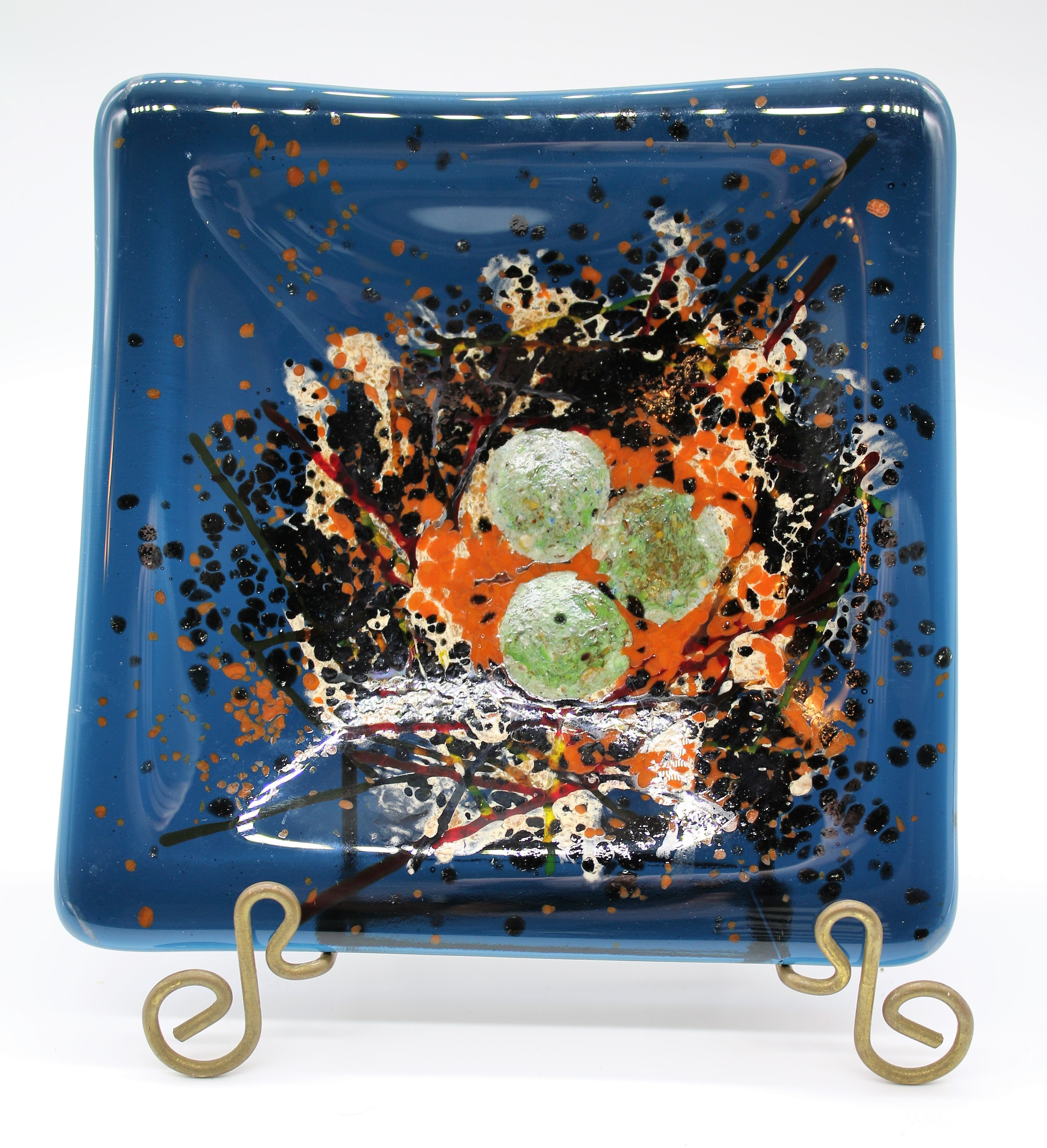 Bird Egg Nest on Deep Blue Transparent Glass Bowl