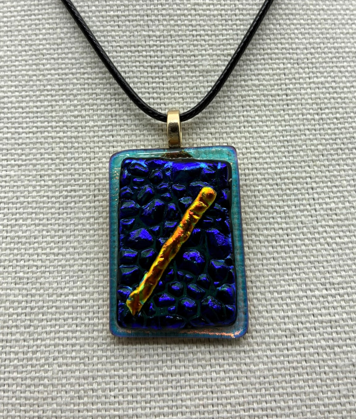 Jewelry - Small turquoise clear rectangle with Blue and Purple Texture background with gold wand