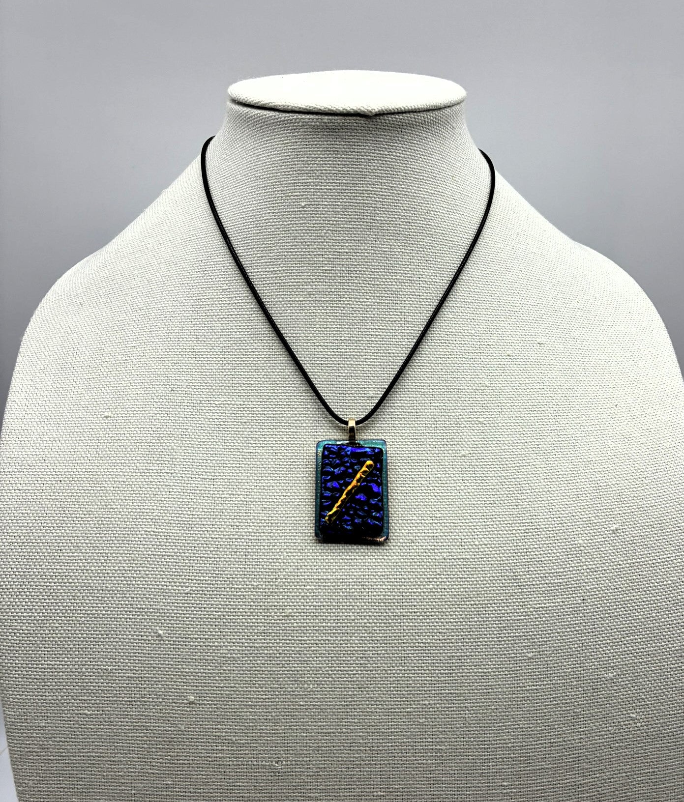 Jewelry - Small turquoise clear rectangle with Blue and Purple Texture background with gold wand