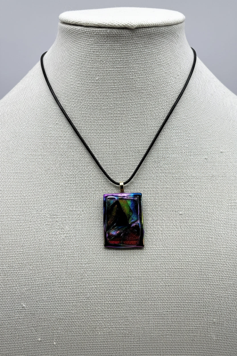 Jewelry - Small Rectangle Black with Varying Color pieces of Dichroic glass and small blue sail in middle