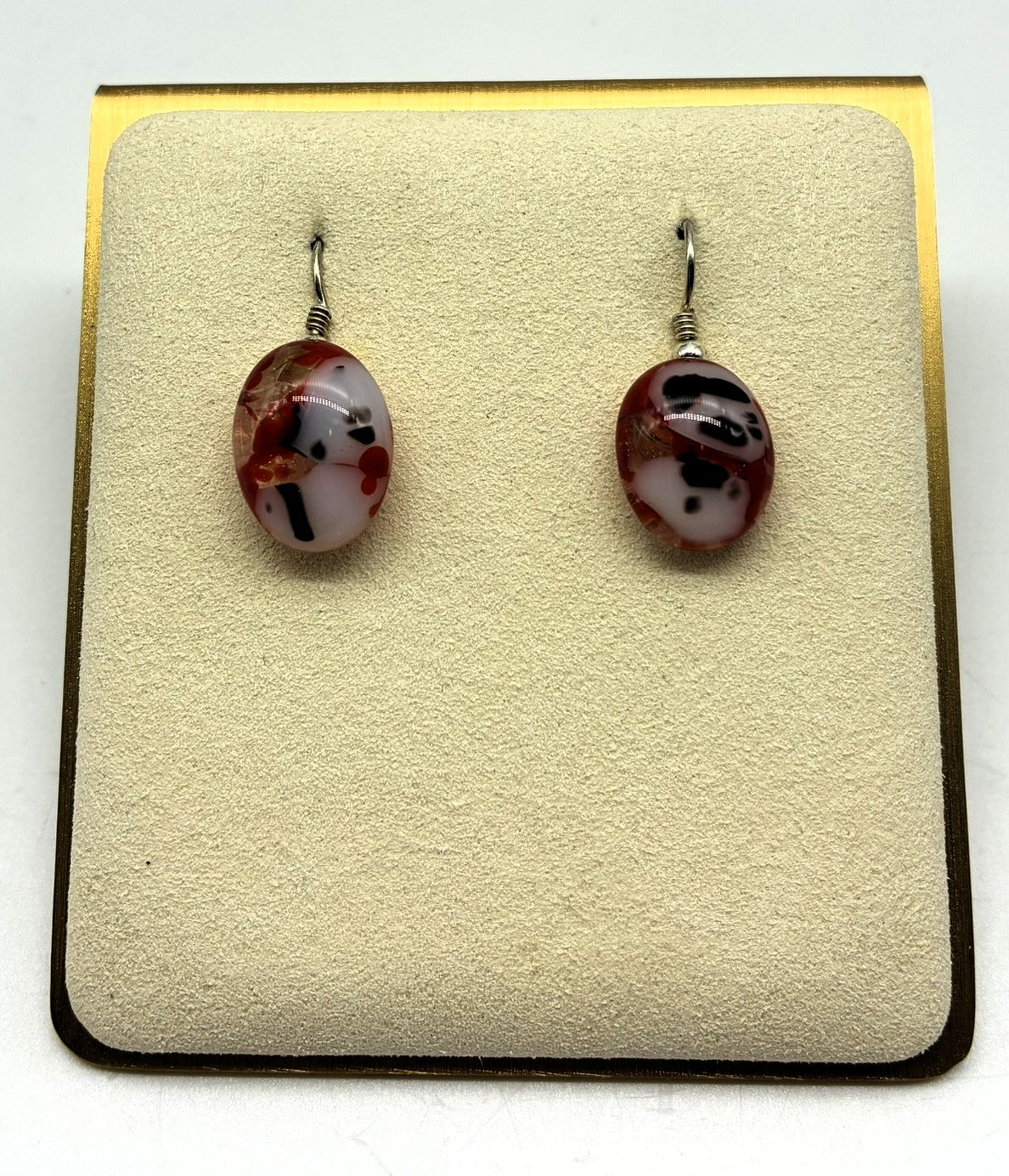 Jewelry - small red, cream and black glass on silver back drop pierced earrings