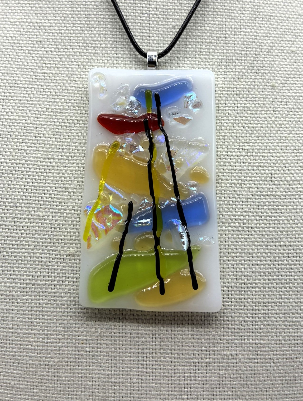 Jewelry- White Oblong glass with Multi Colored glass and dichroic glass.