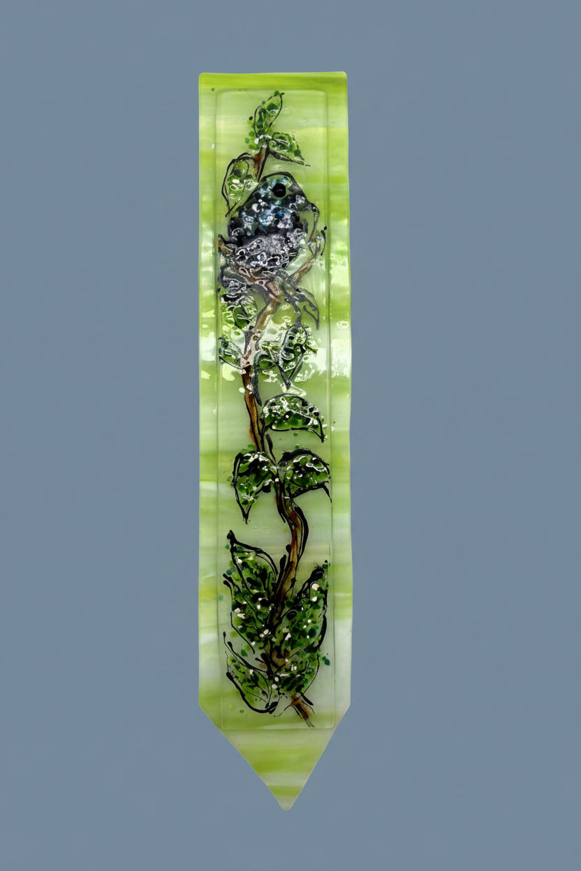 Blue Bird on Green and White Plant Stake