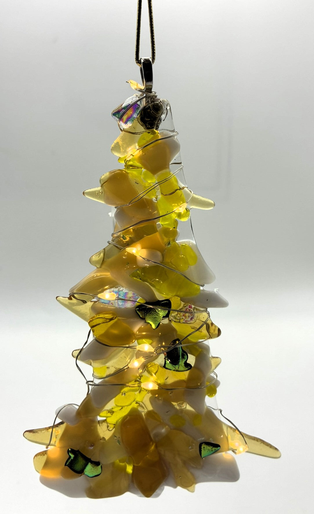 Mixed yellow and white Christmas tree with dichroic and lights ornament