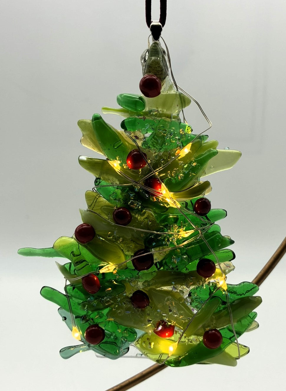 Mixed green Christmas tree with red balls and lights ornament