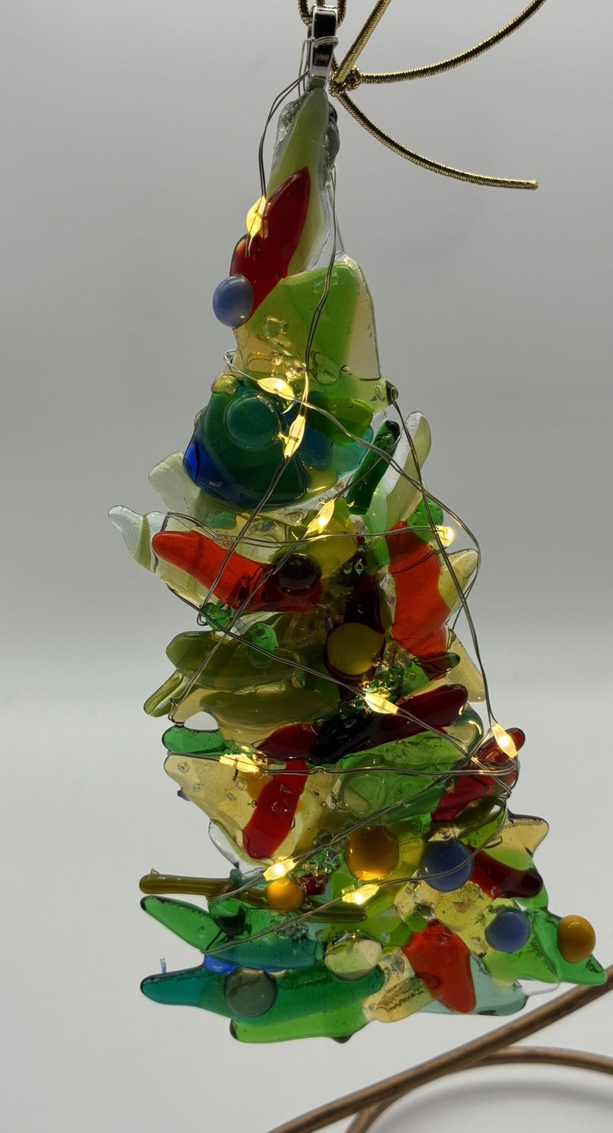 Mixed green, gold and red Christmas tree with mixed balls and lights ornament