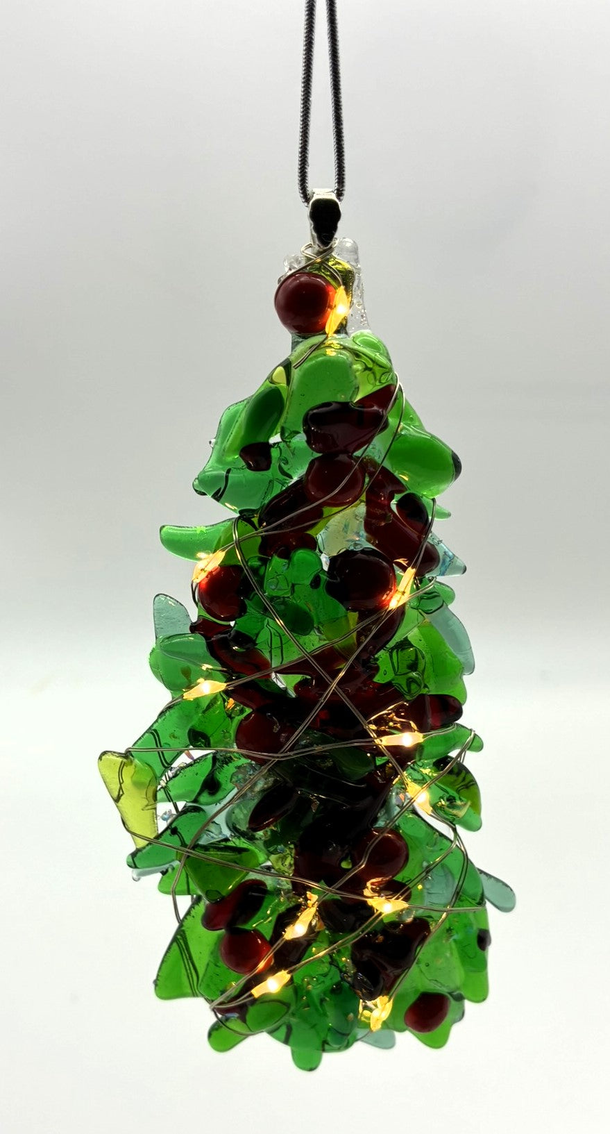 Mixed green Christmas tree with red balls and lights ornament